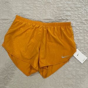 NWT Nike orange running shorts size large